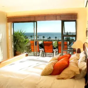 Beachside Villa and Penthouse view bed