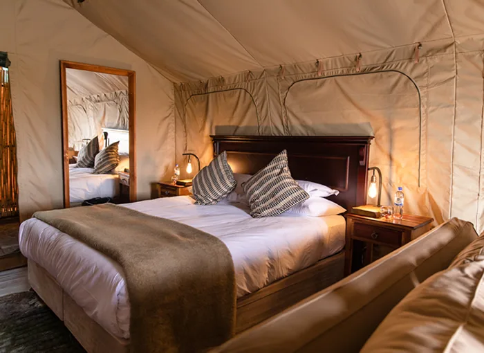 Sibani Glamping Bed abd Room